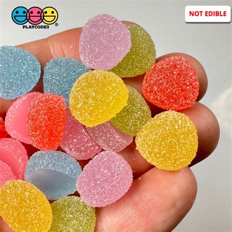 sugar coated candy in a metal box|Sugar Coated Gumdrops .